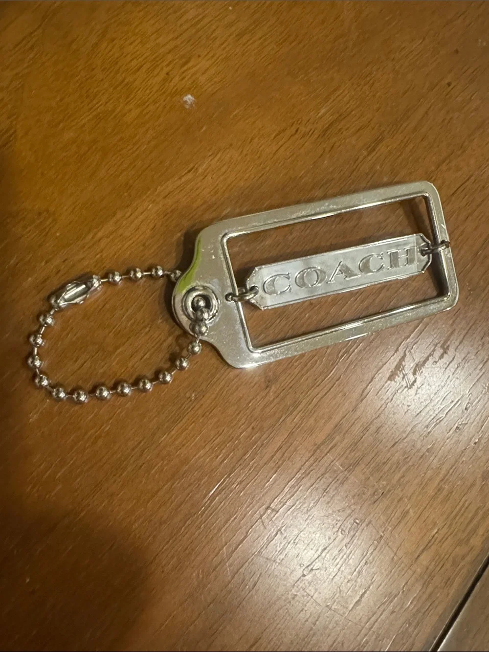 COACH Silver Rectangular Logo Keychain Charm